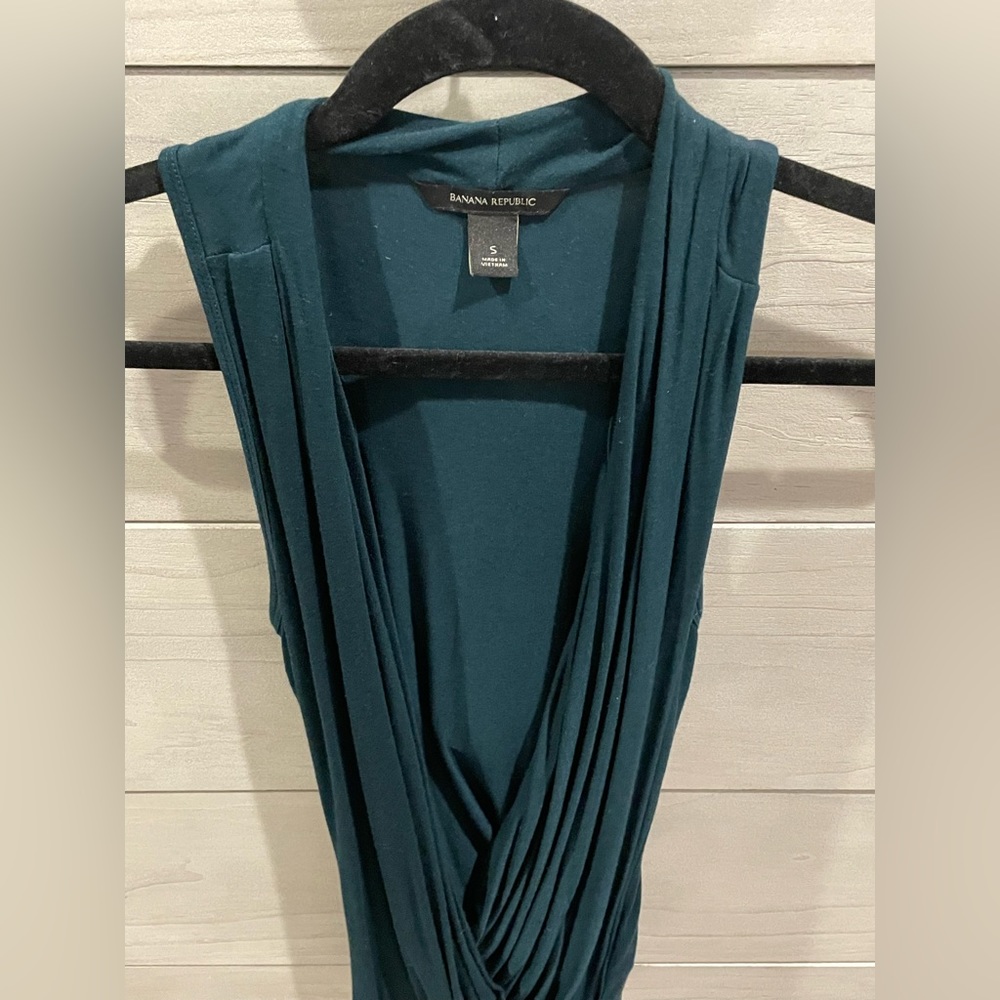 Express sleeveless wrap front top. Turquoise size small